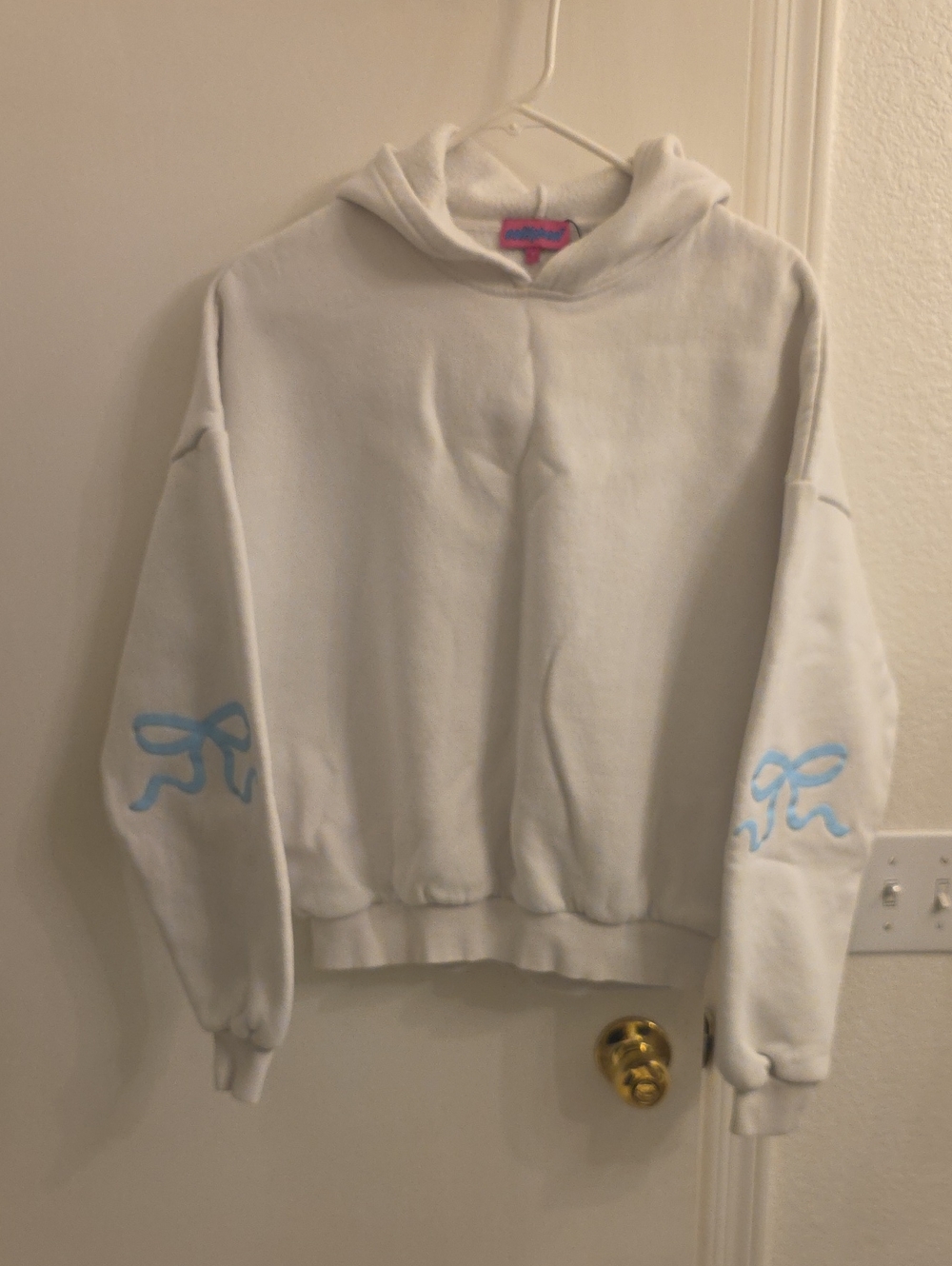 Edikted White Hoodie Sweater with Blue Sleeve Bows